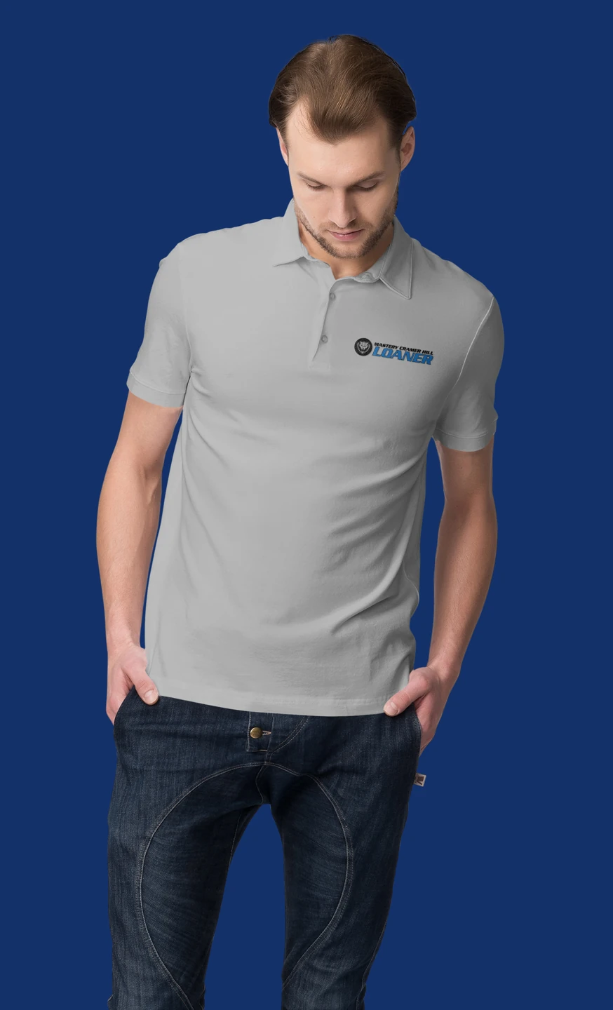 Gray loaner uniform polo rendering for Mastery Charter Schools in Philadelphia, shown on a model against a blue background